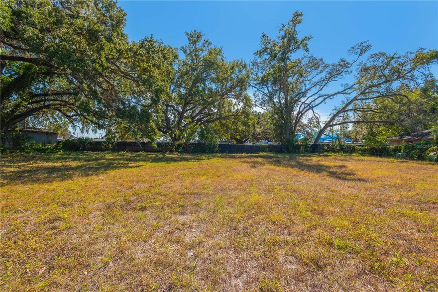 ***AMAZING OPPORTUNITY TO BUILD!*** If you have been looking for a place to build your Florida dream, this is it. This lot is for sale (but the adjacent two lots are available)… you can buy all three and build THREE HOMES, or have a huge home and a huge yard at a great price.  NO HOA OR CDD! And best of all– NOT IN A FLOOD ZONE! This is the opportunity you have been waiting for on three great lots with amazing potential. Build your dream home, modern, traditional, a bungalow... the possibilities are endless! This lot has been cleared, so all the hard work has been done. All you have to do is get building your dream, and you can start enjoying your own private oasis and our amazing Florida lifestyle! The lots next door are also available for sale, so you can build three homes, a larger home, or just have a huge yard!!