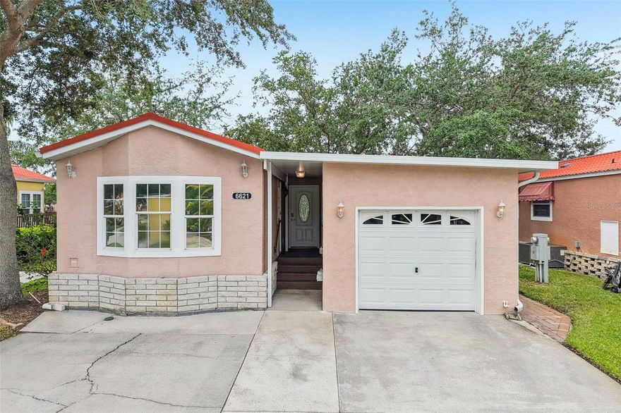 LAKEFRONT! Unique and a hard find waterfront Casita with a garage is located on Lake Bonito in the Casita Village at the exclusive, clothing optional, Caliente Resort. The bedroom has a bay window, pocket door, built in drawers and 2 closets with mirrored closet doors, and a ceiling fan. Main bathroom has been completely remodeled w/ faux stone shower, built in corner shelves, hand bar, and clear glass shower doors w/ bronze framework. Bathroom has a large linen closet with mirror sliding doors. Featuring a climate-controlled 14'x16' garage with a NEW mini split AC, insulated drywall, energy-efficient thermal pane glass windows, and keyless entry. Smart LED Illuminated Mirror Medicine Cabinet and smart bidet toilets in bathrooms. NEW LG washer and dryer! Crown molding and vaulted ceilings. Kitchen offers upgraded maple cabinetry and stainless steel appliances: LG Energy Star refrigerator w/ ice maker, LG microwave/convection oven, a five-burner double convection oven, and Frigidaire dishwasher. The dining, living room and the west facing Florida room overlook the lake and are perfect for colorful sunset views and can be used as a living room. The Living Room was and can be used as a second bedroom with an optional self standing closet. Garage with AC, separate entrance, bathroom and optional closet can also be converted into an in-law unit or 3rd bedroom if needed. Purchase this home and start enjoying the vast amenities this clothing optional resort has to offer, plus the fun activities Caliente has coordinated for you. Do NOT wait, it will not last long!