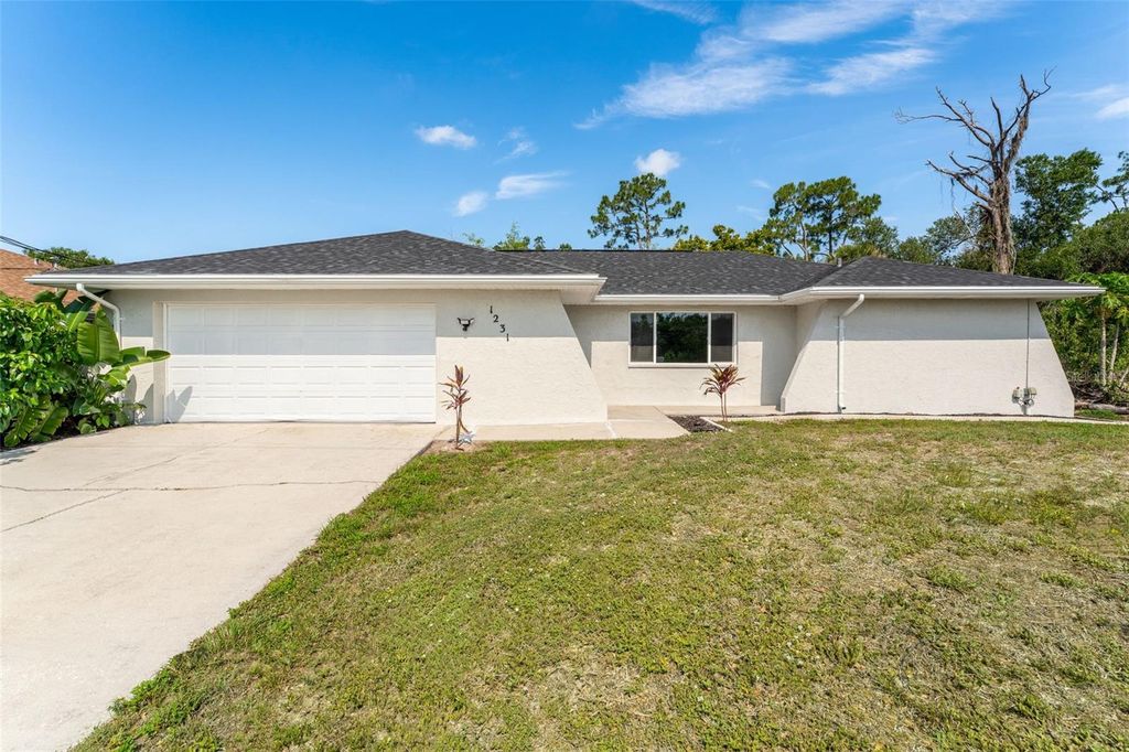 Photo of 1231 Beacon Drive, Port Charlotte, FL 33952 (MLS # C7519640)
