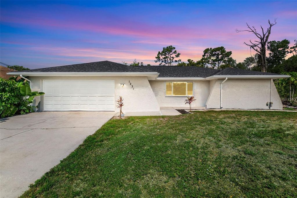 Photo of 1231 Beacon Drive, Port Charlotte, FL 33952 (MLS # C7519640)