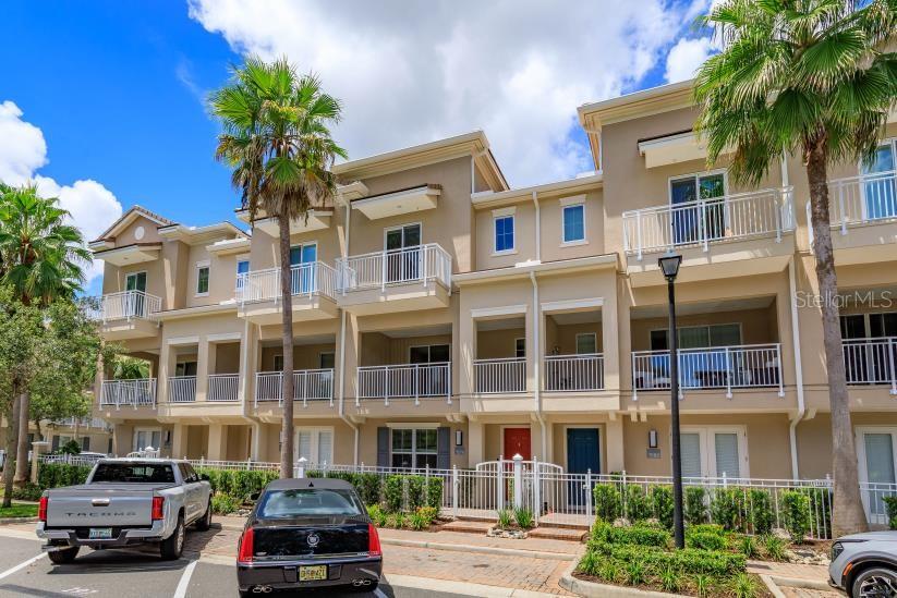 Pass through the front gate and enter into a peaceful oasis in the midst of the best that Heathrow and Lake Mary have to offer. This gorgeous 3 story townhome is spotless and ready for your enjoyment. There is a home office/game room on the first floor along with a finished 2 car garage. Guests will enter through a gated courtyard into a welcoming foyer. The second floor offers a huge chef's kitchen with upgraded appliances, granite counters and more pantry and cupboard space than you could dream of. This is a large bright space that opens to the dining and living rooms and features a very large balcony with lake views. If you like to entertain you will enjoy this floorplan. Upstairs are the guest rooms, laundry and large master suite with luxurious tub, shower and extra lorge walk in closet.
Call today to schedule your private tour. You wilol love calling this special place home.