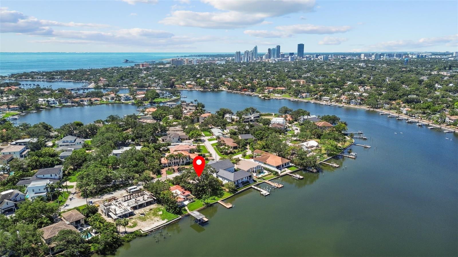Exceptional 80’ x 160’ Waterfront Lot on Coveted Coffee Pot Bayou. A fantastic opportunity to build your custom dream home on one of Snell Isle’s most coveted boulevards. This expansive 80-foot wide, 160-foot deep lot offers tranquil, protected waterfront living with direct access to Tampa Bay. Enjoy picturesque sunsets and watch dolphins and manatees glide past your dock, all from the privacy of your own backyard. Nestled in a quiet enclave of luxury homes, properties on this quiet stretch of Monterey Boulevard seldom come to market—making this a truly unique offering. Just minutes from the historic Vinoy Golf Club, and within walking or biking distance to the Coffee Pot Promenade, Northshore Park, and vibrant downtown St. Petersburg. World-renowned beaches, top-rated restaurants, cultural attractions, and airports are all just a short drive away. Whether you're seeking a peaceful waterfront lifestyle or a central location close to the best of the city, this premier property offers the perfect canvas. Buyer to verify all measurements. Existing home on the property sustained water damage during Helene.