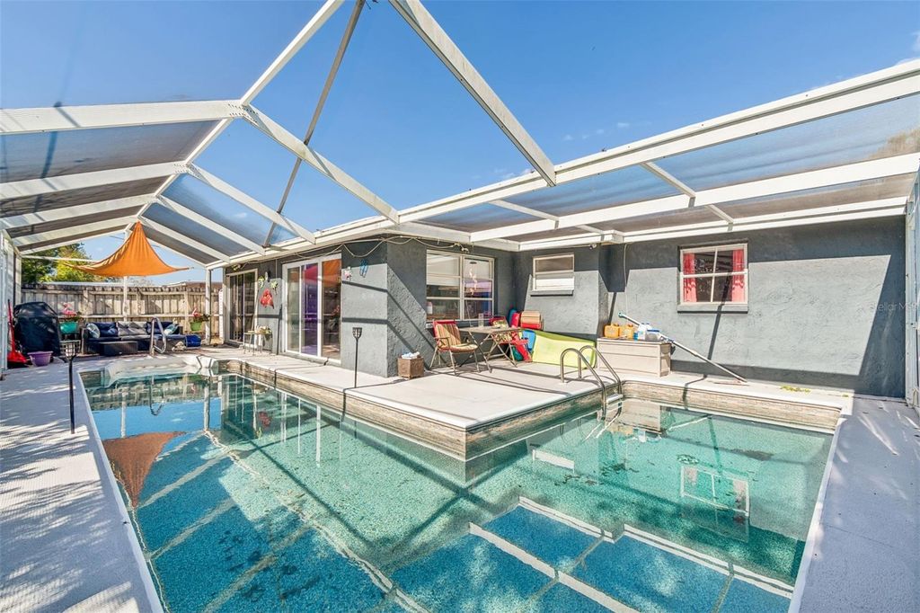 Photo of 7840 Coventry Drive, Port Richey, FL 34668 (MLS # TB8470577)