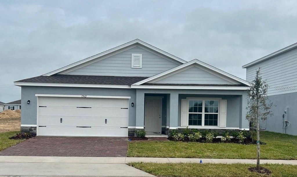 Photo of 1562 Landon Lane, Haines City, FL 33844 (MLS # O6432693)