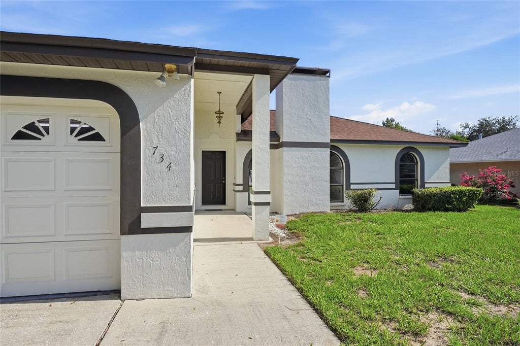 Photo of 734 Lamp Post Lane, Lakeland, FL 33809 (MLS # L4964252)