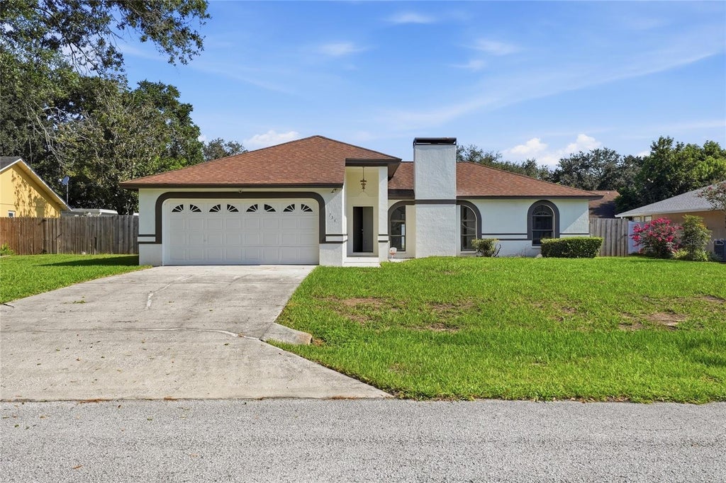 Photo of 734 Lamp Post Lane, Lakeland, FL 33809 (MLS # L4964252)