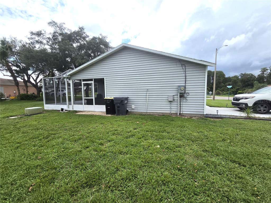 Photo of 7098 Alamanda Boulevard W, Lake Wales, FL 33898 (MLS # P4939560)