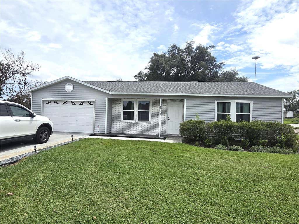 Photo of 7098 Alamanda Boulevard W, Lake Wales, FL 33898 (MLS # P4939560)