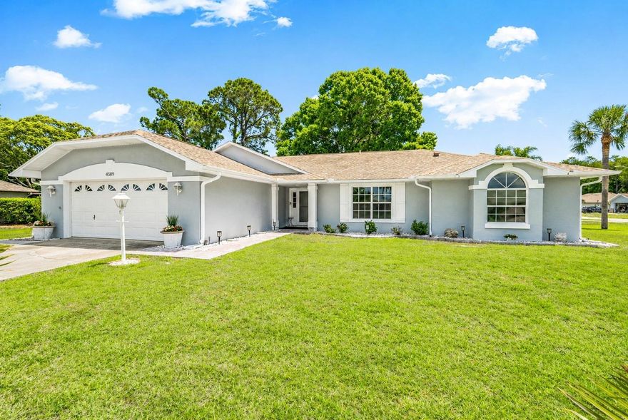 Fully Renovated & Move-In Ready with Water Views!
Charming 3-bedroom, 2-bath, 2-car garage concrete block home situated on a desirable corner lot with serene water views in the Woodlake subdivision of Port Orange. This beautifully updated residence features a bright open-concept floor plan with vaulted ceilings and a split-bedroom layout for optimal privacy.

The fully renovated kitchen is a standout, featuring a butcher block island countertop, new appliances, and modern lighting, creating the perfect space for cooking and entertaining. A new HVAC system adds comfort and efficiency, while thoughtful upgrades throughout provide a fresh, move-in ready feel.

The spacious owner’s suite offers a walk-in closet and a tastefully updated en-suite bath. Enjoy year-round Florida living on the screened-in porch overlooking the water, ideal for relaxing or hosting guests. The extended garage provides additional storage or workspace, adding even more functionality to the home.

Located in a highly rated school district with convenient access to shopping, dining, and everyday amenities—plus just minutes to the beach—this home combines style, comfort, and location.

Corner lot, water view, fully renovated, and packed with upgrades—schedule your showing today!