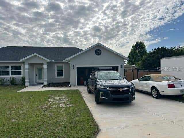 Photo of 12942 SW 70th Terrace, Ocala, FL 34473 (MLS # OM729282)