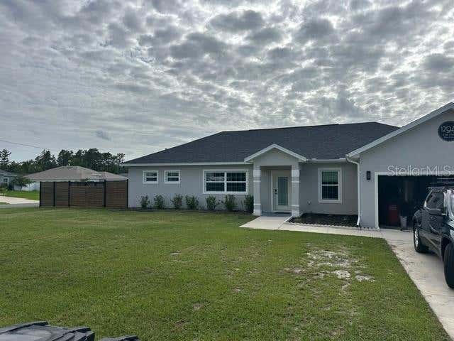 Photo of 12942 SW 70th Terrace, Ocala, FL 34473 (MLS # OM729282)