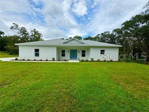 Welcome to this gorgeous 2024 new construction home in Citrus County, offering 3 bedrooms, 2 bathrooms, and 1,700 square feet of thoughtfully designed living space. Set on a sprawling 1.01-acre lot, this property delivers a perfect blend of modern style and natural beauty. The kitchen will impress any home chef with its brand-new premium appliances, elegant quartz countertops, and abundant cabinetry for all your storage needs. Its open-concept layout flows effortlessly into the dining and living areas, creating a bright and inviting space for entertaining or relaxing. Sunlight pours through the expansive windows, enhancing the home’s warm and welcoming feel. The primary suite offers a tranquil escape with a luxurious ensuite bathroom and a spacious walk-in closet. Two additional bedrooms provide versatile space for family, guests, or an office. Outside, the large lot offers plenty of room for outdoor enjoyment, gardening, or even future expansions. Combining comfort, elegance, and room to grow, this home is a rare find. Schedule your private showing today!