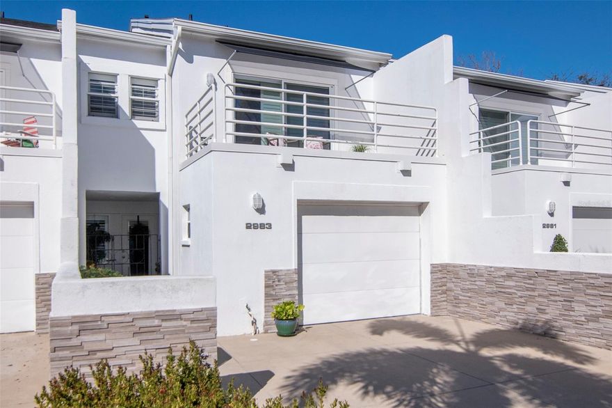 Ideally located in the Courtyards of Tampa, just a few blocks from iconic Bayshore Boulevard, this 2-bedroom, 2.5-bath townhouse blends classic character with distinctive architectural style. Angular walls and rounded metal balcony rails evoke a subtle Art Deco flair reminiscent of South Florida’s timeless design.
A private entry courtyard welcomes you home, creating a charming first impression and an inviting space for container gardens, morning coffee, or evening relaxation. Inside, the first floor features a welcoming foyer, a spacious living room with soaring ceilings, a dedicated dining area, kitchen, convenient half bath, and a screened rear patio—perfect for entertaining or unwinding in comfort.
Upstairs, you’ll find two generous en-suite bedrooms, each with its own private bathroom for comfort and privacy. A secondary staircase leads to a versatile loft space, ideal for a home office, reading retreat, fitness nook, or creative studio.
Parking is effortless with a private one-car garage and driveway space for two additional vehicles, providing convenience for residents and guests alike.
Residents enjoy access to the community pool and the peace of mind of a comprehensive HOA that includes professional management, water, sewer, trash, roof reserves, exterior paint, exterior pest control, termite bond/warranty, landscaping, and pool maintenance.
Perfectly positioned in South Tampa, this home is just minutes from premier shopping, dining, entertainment, and the vibrant lifestyle that makes Tampa one of Florida’s most desirable places to live.
