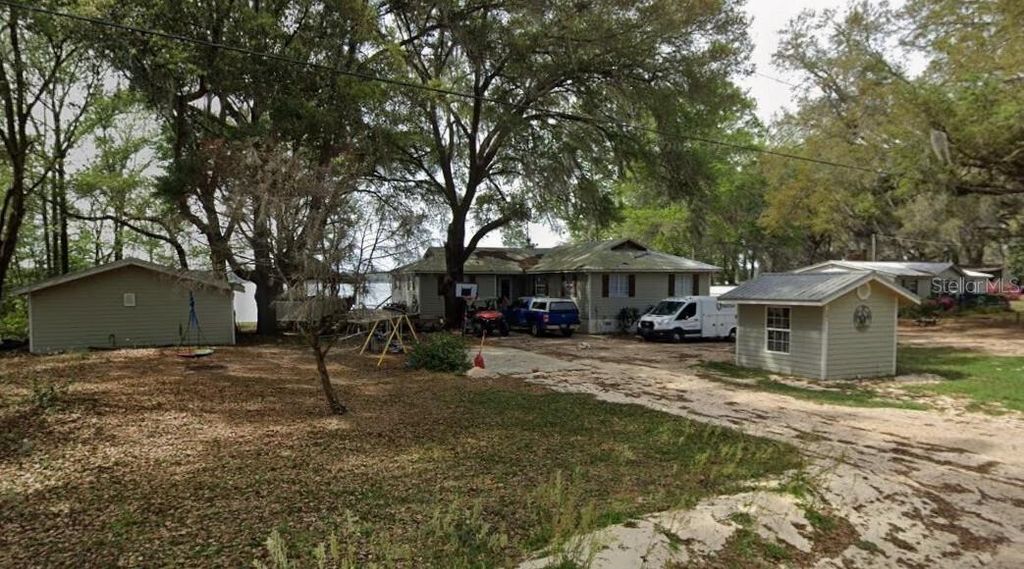 Photo of 101 Walker Drive, Interlachen, FL 32148 (MLS # TB8500035)