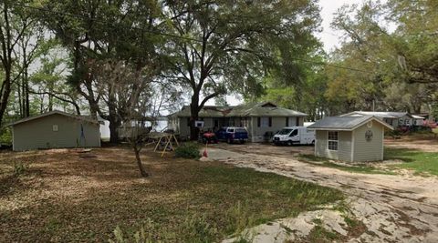 Photo of 101 Walker Drive, Interlachen, FL 32148 (MLS # TB8500035)