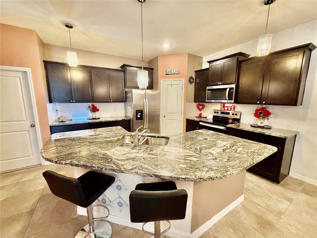 Photo of 31115 Mango Fade Way, San Antonio, FL 33576 (MLS # TB8474485)