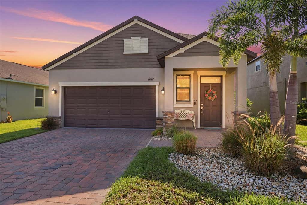 Photo of 11767 Lake Boulevard, New Port Richey, FL 34655 (MLS # TB8525802)