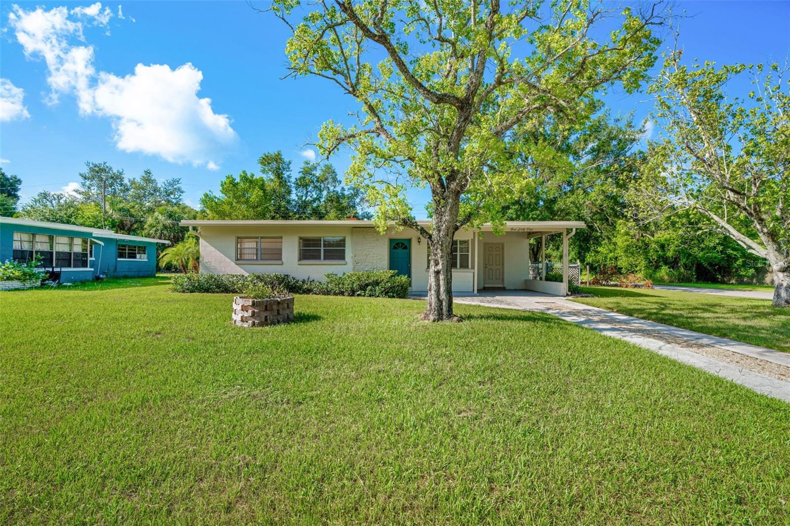 This beautifully refreshed home sits on a desirable corner lot and features brand-new interior and exterior paint, giving it a clean, modern feel inside and out. Enjoy the convenience of a rare indoor laundry room and fully remodeled bathrooms designed with style and functionality in mind. Abundance of storage with extra linen closet in hallway. The home boasts durable all-tile flooring throughout—perfect for easy maintenance and a seamless look. The large fully fenced yard offers privacy and space for outdoor enjoyment. Additional shed allows for plenty of storage. Don’t miss this move-in-ready gem with updates you'll love in every room!