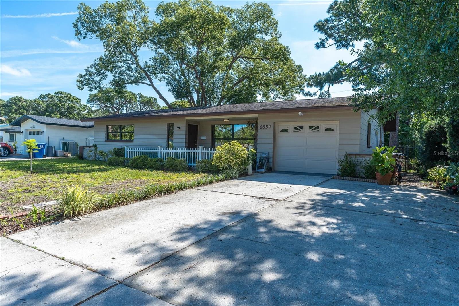Highest and Best by 2pm on Saturday 6/3. This amazing 2 bed, 2 bath, 1 car garage block home is the one you have been waiting for! Located in a non-flood zone area of Pinellas Point, this affordable and well built home offers easy living and quick access to the best that St. Petersburg has to offer. With a large living room, separate dining area and a fully enclosed and covered Florida Room, there is plenty of room for the family! The kitchen and bathrooms boast stone countertops, the living room has beautiful plantation style shutters, and you will love the fully restored Terrazzo flooring throughout the home! The over sized 1 car garage provides plenty of room for storage well! Only a few blocks away from the waters of Tampa Bay, boat ramps and Pinellas Point Park, and a short walk to the famous Tocobaga Mounds. Do not wait, set your appointment to see this incredible home now!