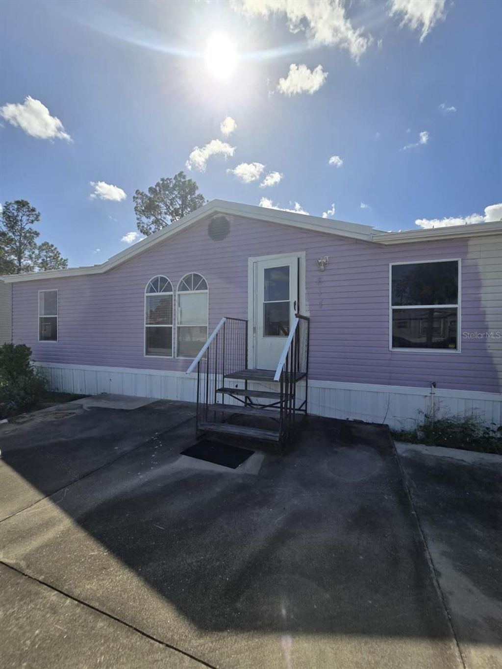 Photo of 617 W Lemon Street, Davenport, FL 33837 (MLS # O6356099)