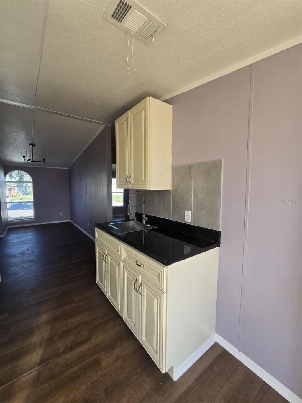 Photo of 617 W Lemon Street, Davenport, FL 33837 (MLS # O6356099)