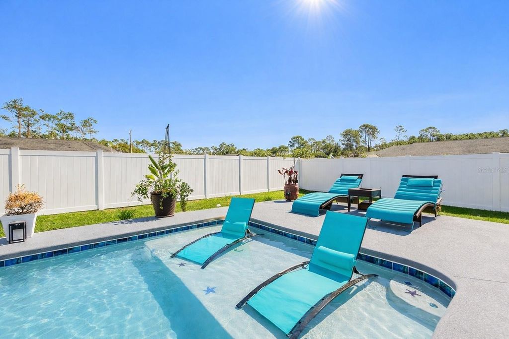 Photo of 14 Rybark Lane, Palm Coast, FL 32164 (MLS # FC315701)