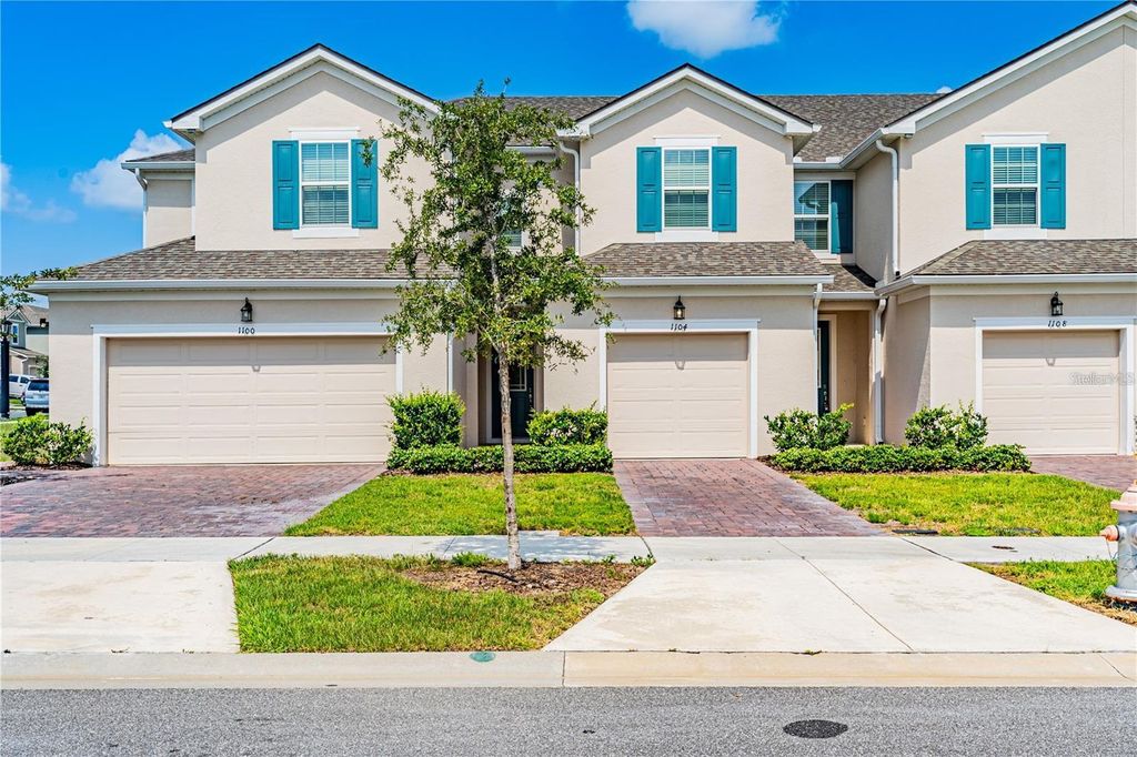 Photo of 1104 Lakeshore Breeze Place, Kissimmee, FL 34747 (MLS # O6402729)