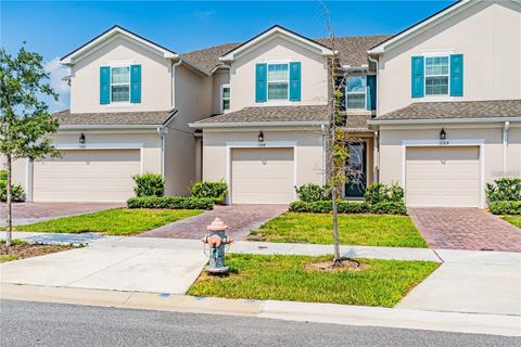 Photo of 1104 Lakeshore Breeze Place, Kissimmee, FL 34747 (MLS # O6402729)