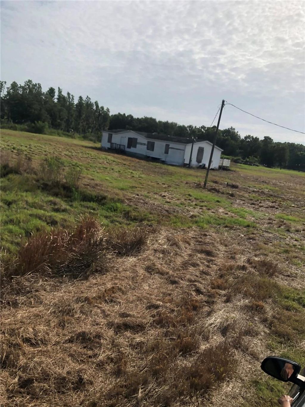 Photo of 2012 Engessor Road, Zephyrhills, FL 33540 (MLS # TB8405260)