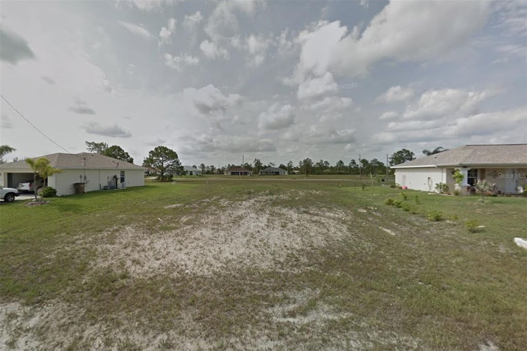 Photo of 2215 NE 34th Ln, Cape Coral, FL 33909 (MLS # O6342440)