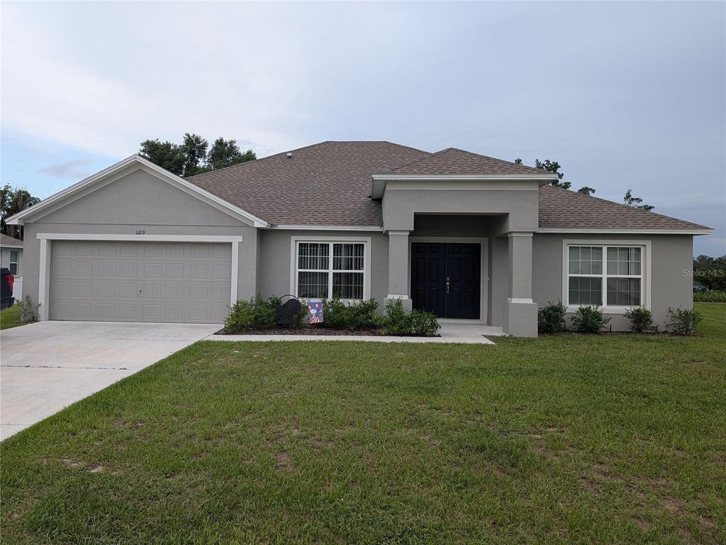 Photo of 1209 Ridge Drive, Avon Park, FL 33825 (MLS # O6330257)