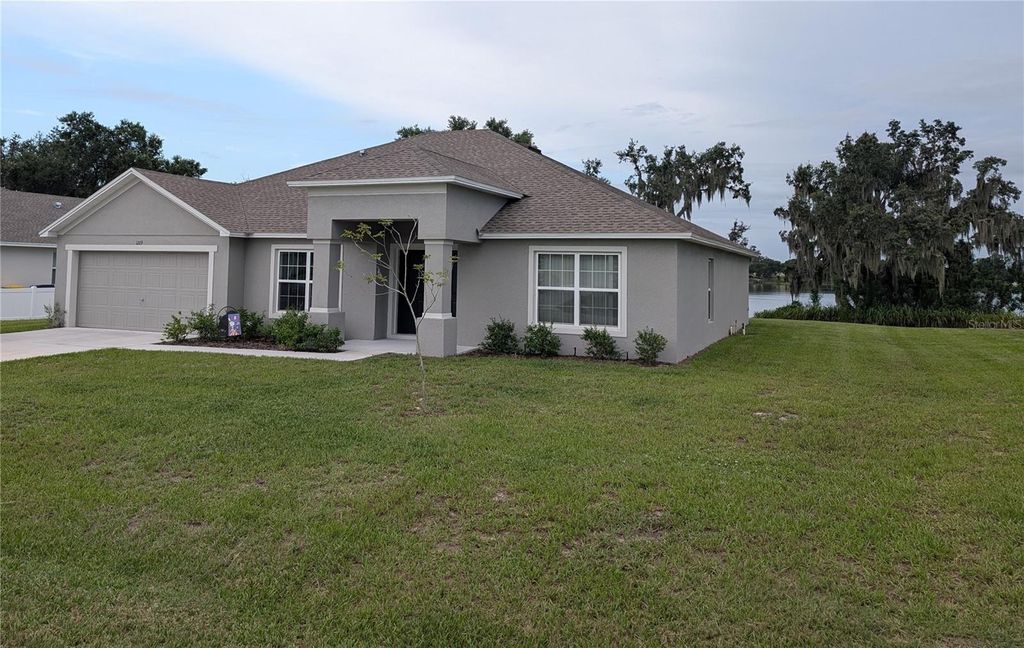 Photo of 1209 Ridge Drive, Avon Park, FL 33825 (MLS # O6330257)