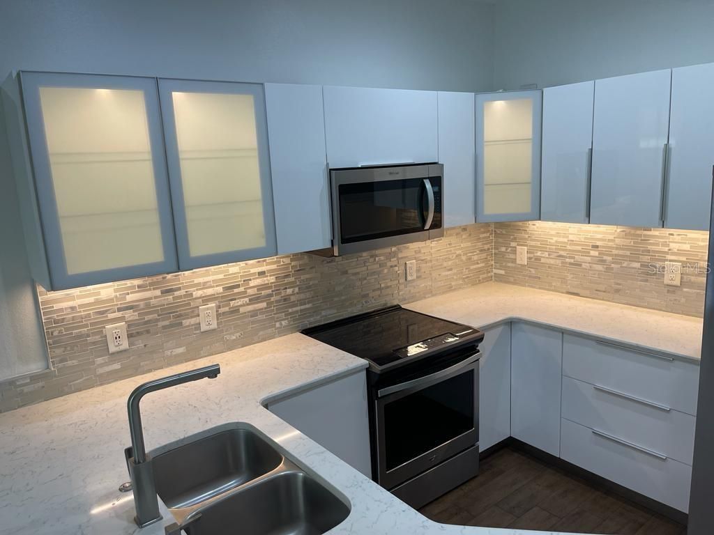 Photo of 3153 Capri Isle Way, Orlando, FL 32835 (MLS # O6396126)