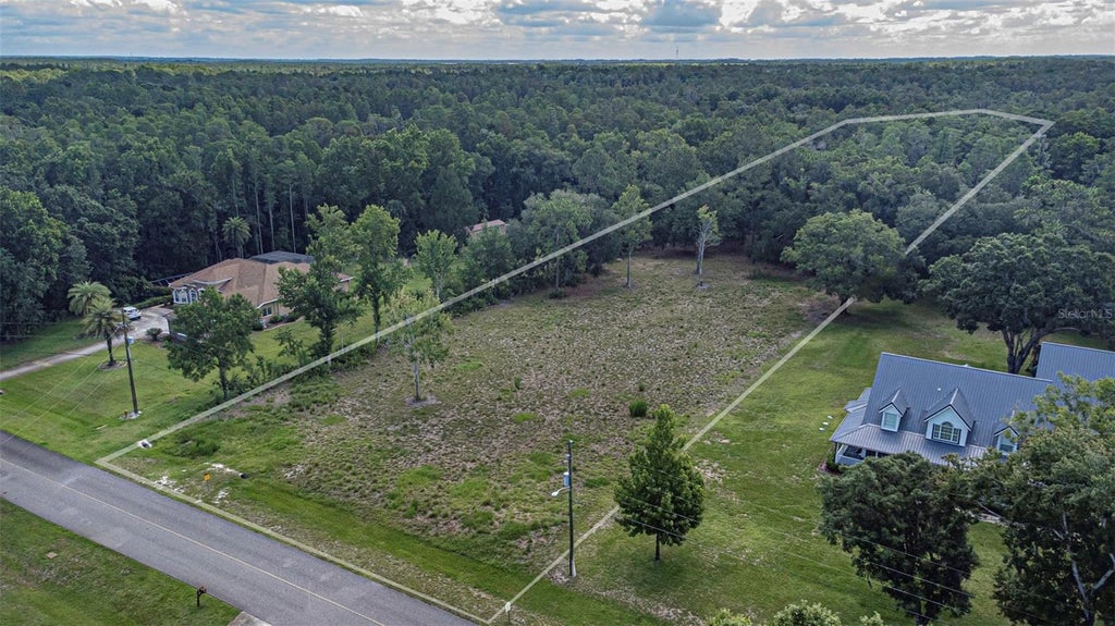 Photo of 8844 Shenandoah Run, Wesley Chapel, FL 33544 (MLS # O6418920)