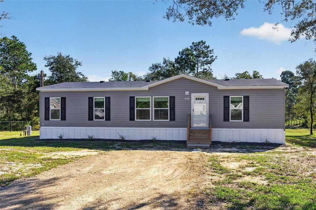 Photo of 2231 SE 132nd Court, Morriston, FL 32668 (MLS # OM734008)