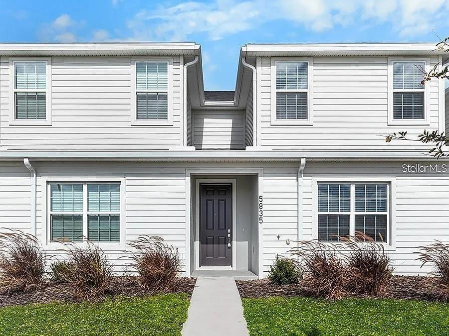 2-story new construction townhome with 1,705 square feet, 3 bedrooms with loft, 2.5 baths, a 2-car garage, located in the brand-new Crossings community offering natural and park amenities. Downstairs, a gourmet kitchen with Cambria countertops, shaker-style wood cabinets, Samsung stainless steel appliances, and a pantry. The entire lower level and upstairs baths are finished with luxury vinyl plank flooring, with stain-resistant carpet in the bedrooms. Upstairs, you'll find three spacious bedrooms including your owner's suite complete with a walk-in wardrobe, linen closet, and a private en-suite bath with dual vanities and a tiled shower. Additional features for your convenience include a half bath downstairs, loft, custom-fit window blinds throughout, a Samsung full-sized washer and dryer, energy-efficient insulation and windows, and a full builder warranty.