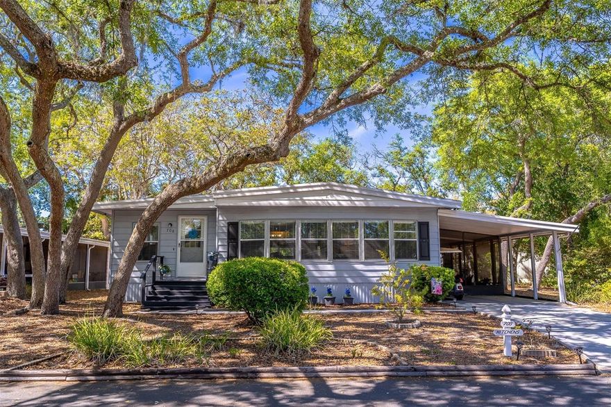 This is more than just a home, it’s a lifestyle. Don’t miss your opportunity to enjoy easy living in one of Lake Mary’s most desirable 55+ communities – The Forest!  Welcome to this beautifully maintained and exceptionally spacious home offering almost 1,500 square feet of comfortable living space in a thoughtfully designed two-bedroom, two-bath layout. From the moment you arrive, you’ll appreciate the wide driveway with covered parking that easily accommodates both your vehicle and golf cart side-by-side, along with a screened patio area on the carport—perfect for relaxing outdoors. The home also features a generous storage room with washer and dryer and a fully fenced yard; all set on a wide lot with attractive landscaping.  Step inside and you’re immediately greeted by an open and airy floor plan filled with natural light. The kitchen is truly the heart of the home, featuring a large pantry, abundant cabinet and counter space, and newer stainless-steel appliances—ideal for both everyday living and entertaining. Just off the kitchen is a spacious dining area highlighted by an oversized built-in cabinet offering even more storage and serving space.  The living room is bright and inviting, enhanced by a beautiful bay window that fills the space with light. Newer vinyl plank flooring runs throughout all the main living areas, adding a modern touch while being both durable and easy to maintain. You’ll find an expansive Florida room currently used as a cozy TV retreat, creating the perfect spot to unwind.  Off the Florida room and guest bedroom is a large bonus room that is heated and cooled and offers flexible space that can be used as a craft room, workshop or great man-cave.  Currently there is a hot tub located in this space but owner has never used the hot tub.  From the bonus room you can enter the backyard from the new deck with Trex decking make this weatherproof and low maintenance.  Outdoor living is just as impressive, with a large, screened patio offering endless potential for relaxation or entertainment. Inside, both bedrooms are generously sized and include walk-in closets, with the primary suite offering a spacious layout, abundant natural light, and an updated bath complete with a step-in glass-enclosed shower and large vanity.  This home is truly move-in ready, with a roof that is only six years old and a level of cleanliness and care that is immediately noticeable throughout. With its open layout, abundant storage, and bright, updated feel, this property is a rare find that combines comfort, functionality, and style.  This is a highly sought-after 55+ community in the heart of Lake Mary, you’ll enjoy an unbeatable location just minutes to I-4, shopping, dining, and new medical facilities. This gated, golf-cart-friendly community is known for its welcoming atmosphere and vibrant lifestyle, making it easy to get involved and build lasting friendships. Residents enjoy an incredible array of amenities including two resort-style pools, a hot tub, saunas, shuffleboard courts, tennis and pickleball courts, a billiard room, card room, library, craft room, and resident laundry facilities. The beautiful clubhouse serves as the social hub of the community, offering a full calendar of activities, events, and gatherings year-round.  The monthly HOA fee includes cable TV, Internet and Trash Pickup.  Don’t wait to schedule a showing – this will sell quickly!!!!