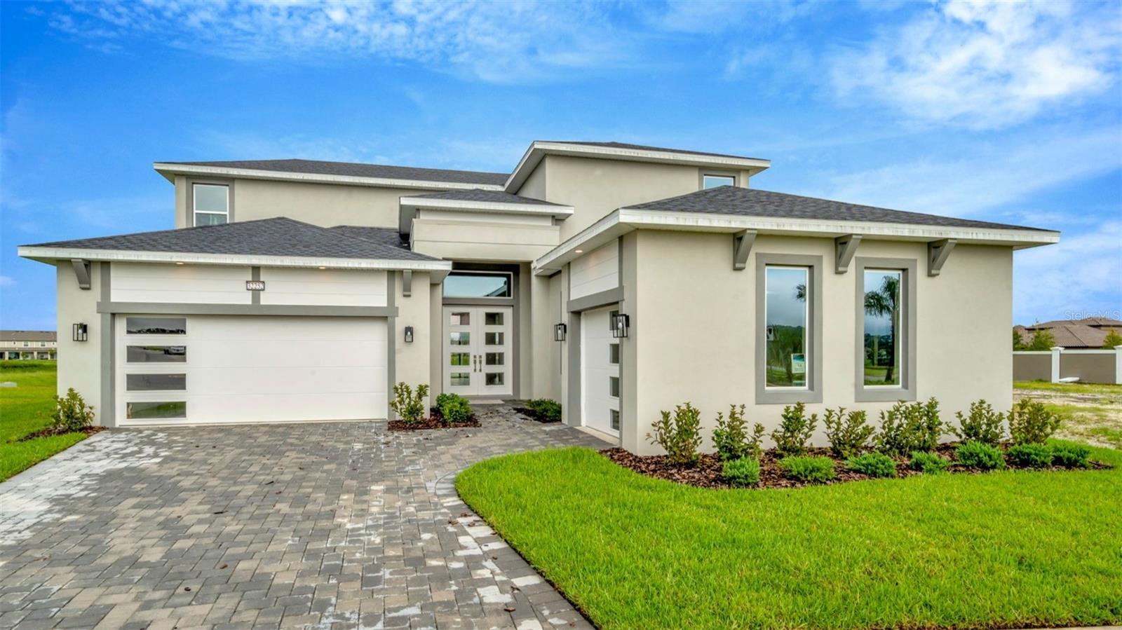 UNDECORATED FIELD MODEL - (Real property so it's been listed but JUST RELEASED FOR FULL MARKETING)
Welcome home to the Egret Floorplan, offering plenty of space, natural light and beautiful views behind the home. Inside, the foyer leads to an open-concept living space with 10ft high ceilings and abundant natural light. The living room, dining area, and kitchen blend seamlessly, with the kitchen boasting high-end appliances, a spacious island, and a walk-in pantry.
The home has six bedrooms and four bathrooms, including a master suite with a luxurious en-suite bathroom featuring a oversized walk in shower and frameless shower and a large bonus room on the 2nd floor. The other bedrooms are well-sized with built-in closets, and the additional bathrooms have modern finishes.
Outside, the backyard offers a covered Lanai, with an outdoor kitchen pre-plumbing ready for your new design. The three-car garage complements the home’s contemporary design and provides ample storage