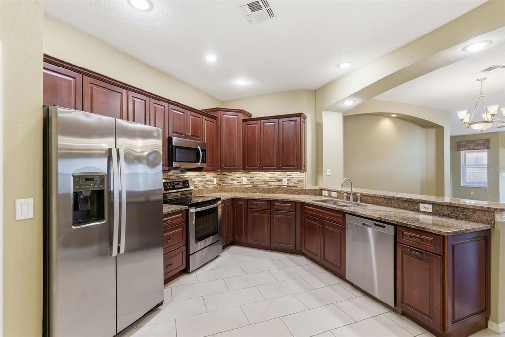 Photo of 30442 Lettingwell Circle, Wesley Chapel, FL 33543 (MLS # TB8503025)
