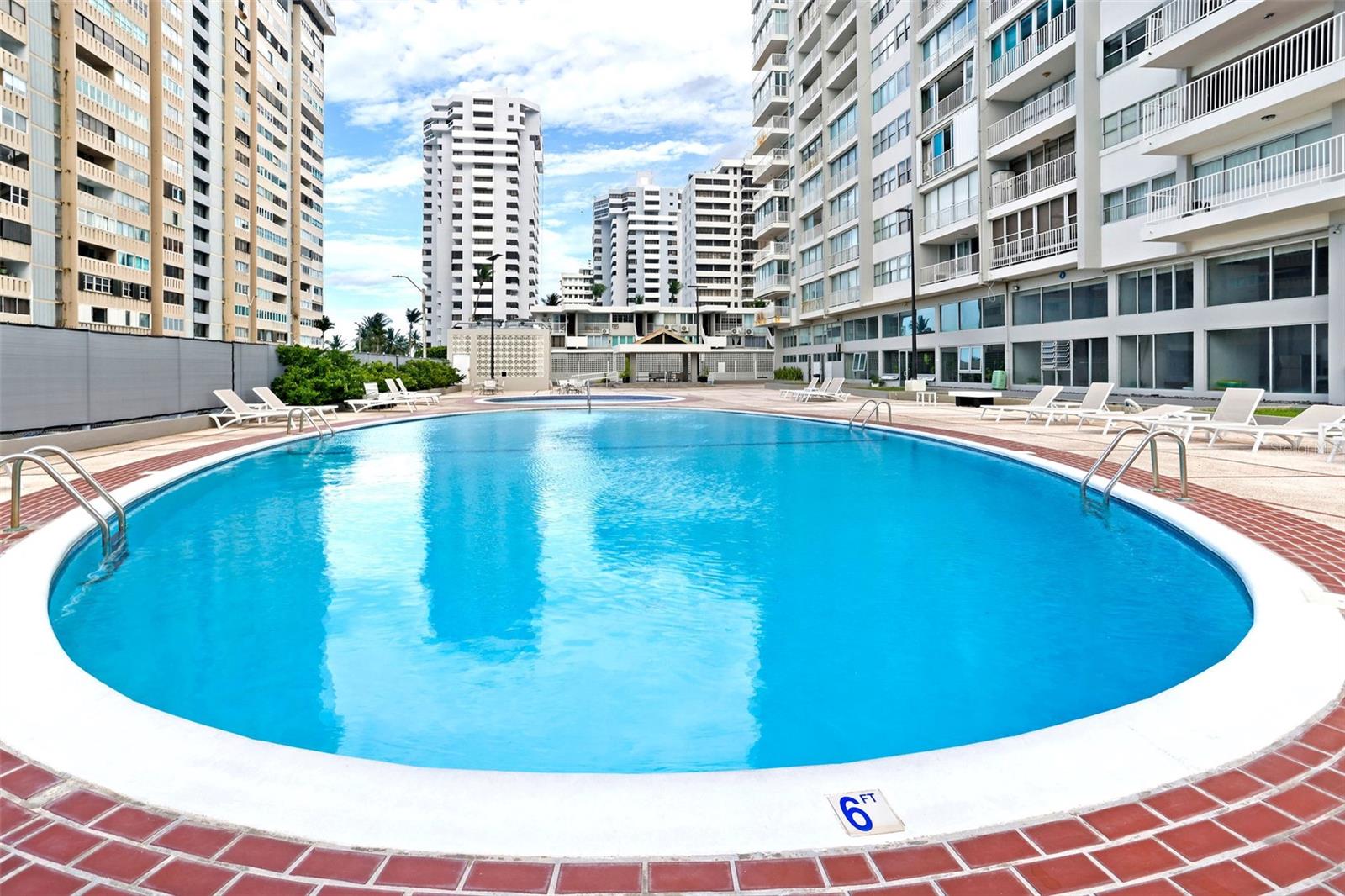 Experience modern cabana living in the heart of Condado at Torre del Mar, one of the area’s most established and secure residential buildings. This fully renovated furnished studio cabana offers a sleek, open-concept layout that blends clean, contemporary design with comfort and functionality. From the moment you enter, you’ll appreciate the attention to detail and the thoughtful integration of smart living features, including a fully connected Alexa system that controls lighting, climate, and entertainment throughout the unit.
The cabana includes noise-canceling wall construction for enhanced privacy, a washer/dryer in-unit, and backup power to ensure uninterrupted living. The bathroom is outfitted with an automatic Toto toilet with a remote control, adding an extra level of comfort and convenience to the space. These features work together to create a peaceful, high-tech sanctuary in the center of San Juan’s most vibrant neighborhood.
Outdoors, enjoy a private front patio ideal for relaxing or entertaining, and a small backyard featuring a jacuzzi and solar panels for added sustainability. As part of the Torre del Mar community, residents benefit from 24-hour security, a swimming pool, and a gym. With the beach, shops, restaurants, and top schools just steps away, this unique property offers a rare opportunity to enjoy luxury, privacy, and smart living—fully furnished—in one of Puerto Rico’s most desirable coastal locations.