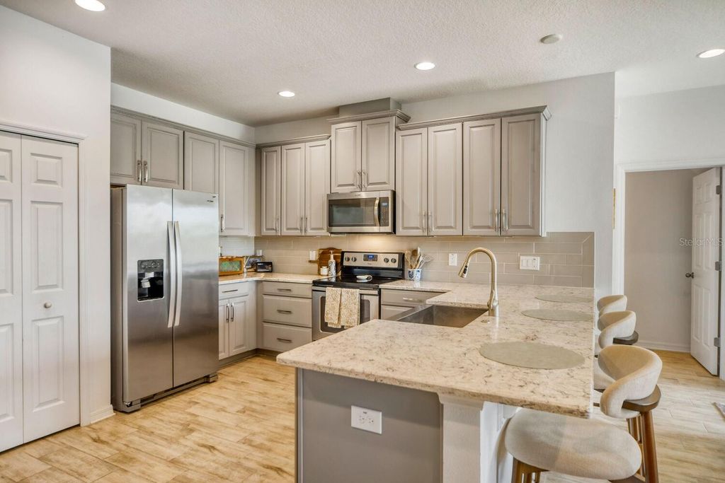 Photo of 17412 Promenade Drive, Clermont, FL 34711 (MLS # O6392881)