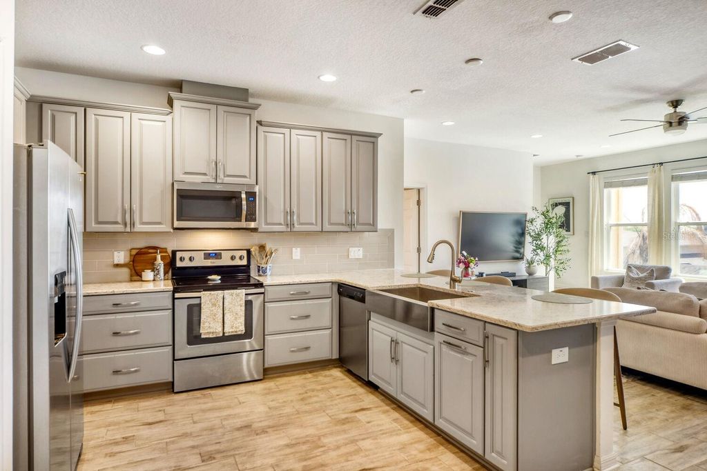 Photo of 17412 Promenade Drive, Clermont, FL 34711 (MLS # O6392881)