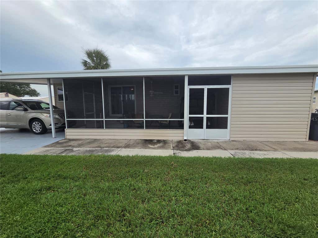 Photo of 628 Lakeside Ranch Lane, Winter Haven, FL 33881 (MLS # P4939529)