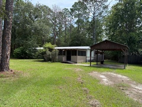 Photo of 20399 N State Road 235, Brooker, FL 32622 (MLS # GC533711)