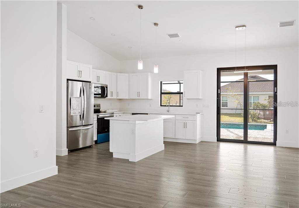 Photo of 1436 NW 31st Avenue, Cape Coral, FL 33993 (MLS # OM718773)