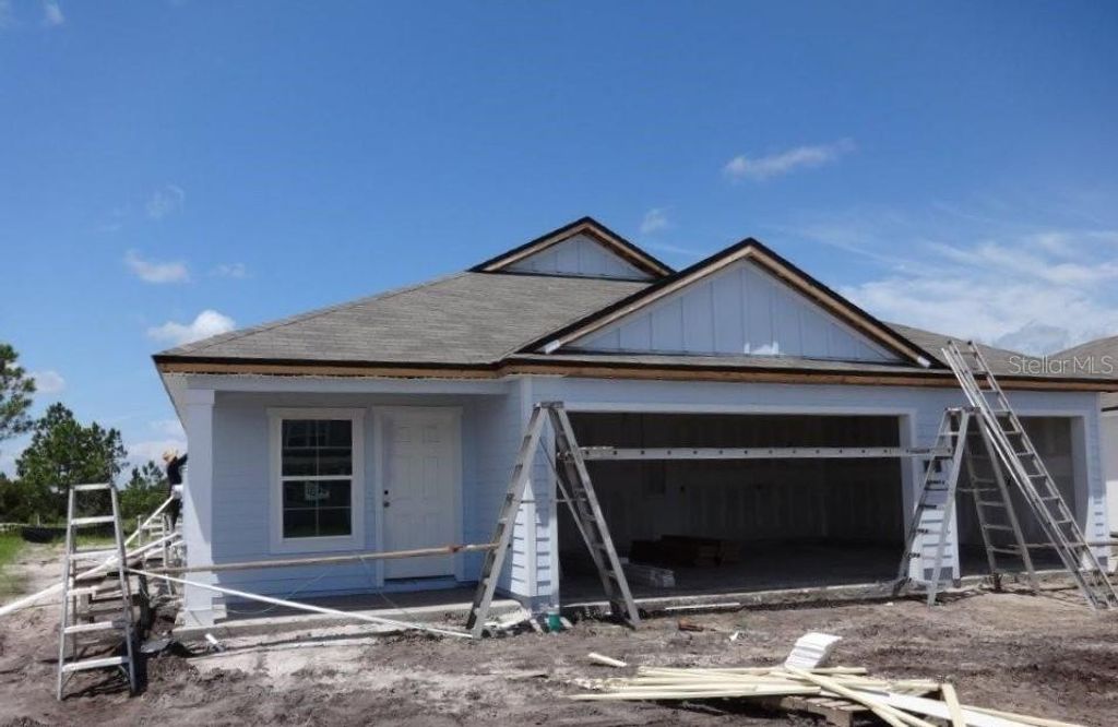 Photo of 11 SUMMERWOOD ROAD S, PALM COAST, FL 32137 (MLS # FC292149)