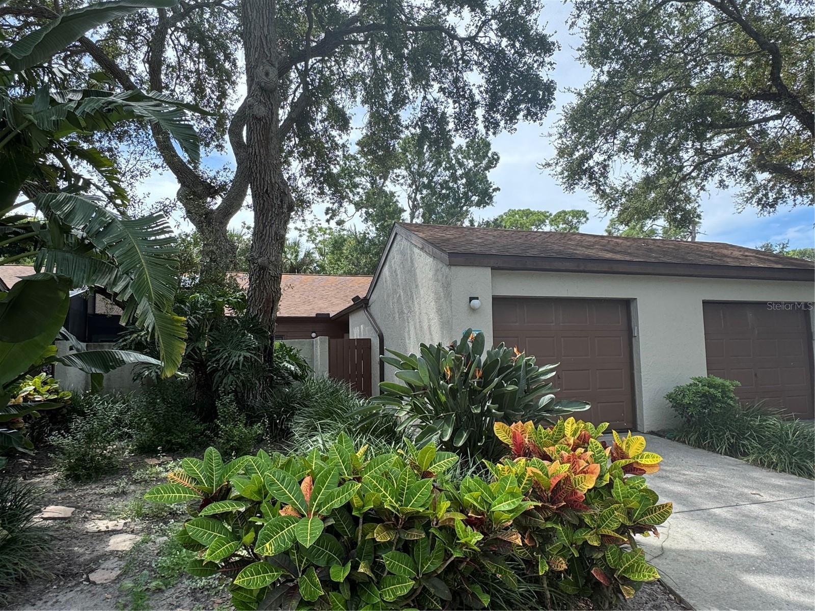 Fantastic opportunity to own in the desirable 43 West Oaks community! Surrounded by mature oaks and lush landscaping, this neighborhood captures the charm of “Old Florida.”
This spacious 2-bedroom, 2-bath condo is ready for its next owner to make it their own. The split floor plan provides privacy, with a guest bedroom and bath at the front and a generous primary suite tucked away in the back. The primary suite features sliding glass doors that open to a large, enclosed courtyard—perfect for creating your own private Florida oasis.
The open layout boasts vaulted ceilings and a bright, airy living area filled with natural light. The kitchen is nicely open, offering plenty of workspace and sliding glass doors to the front courtyard, ideal for enjoying morning coffee or evening breezes.
With abundant outdoor living space and multiple courtyards, this home seamlessly blends indoor and outdoor living. Don’t miss your chance to call 43 West Oaks home! Abound with amenities- 43 West Oaks boasts a community pool, pickleball courts, clubhouse and walking trails around a large lake. HOA includes cable, wifi, grounds maintenance and amenities.