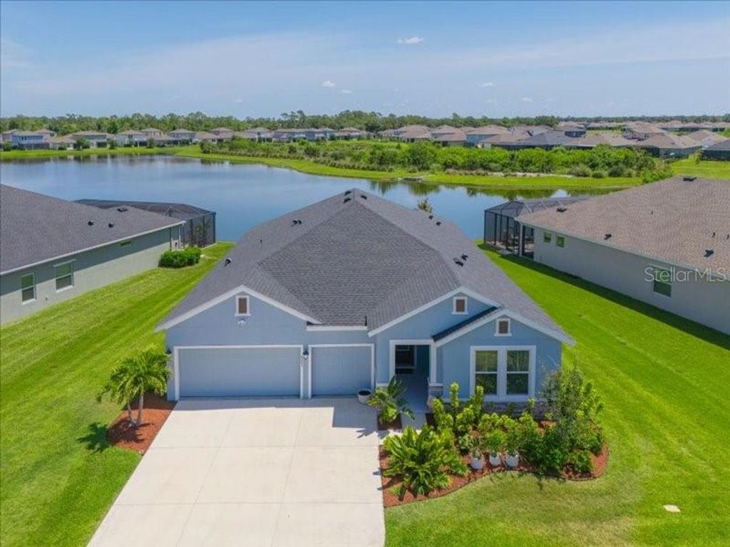 Photo of 8251 Abalone Loop, Parrish, FL 34219 (MLS # A4691952)