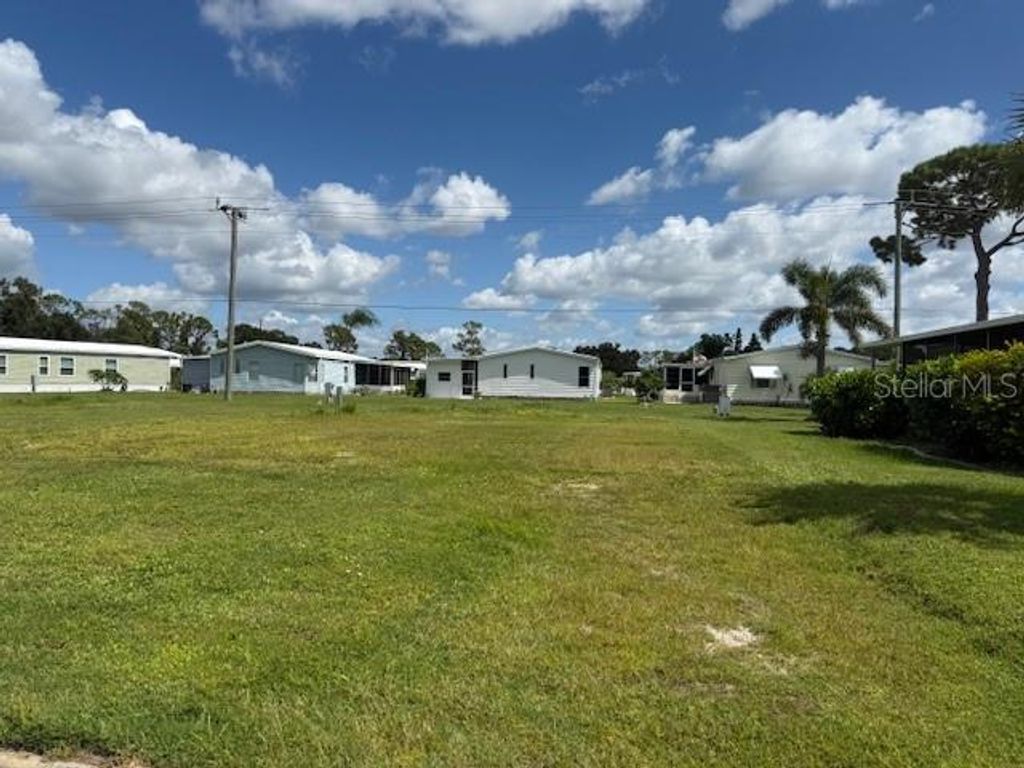 Photo of 209 El Prado Ave, North Port, FL 34287 (MLS # TB8431926)