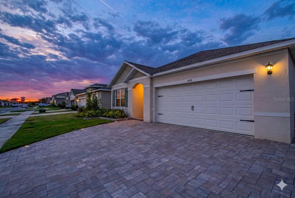 Photo of 1979 Cacutta Way, Kissimmee, FL 34744 (MLS # O6374518)